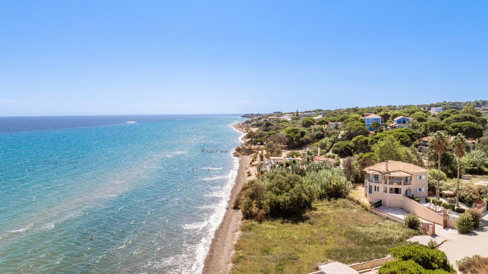 Aerial view of Royal Seaview Villa beside the Ionian Sea